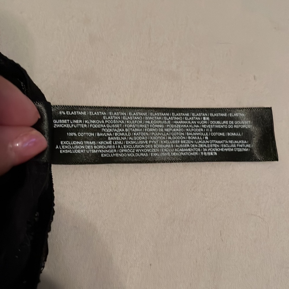 Mostly black lace, sheer coverage to front area. Thin thong area. - Picture 6 of 8